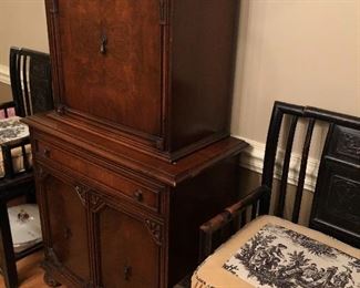 Antique cabinet between the pair of Chinese chippendale chairs 