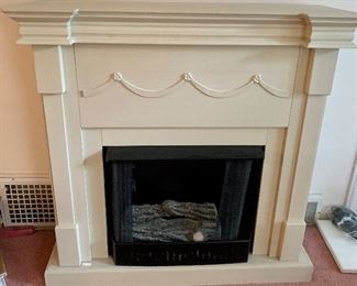 Freestanding white electric fireplace 
42 wide x 14.5 deep x 42h $95