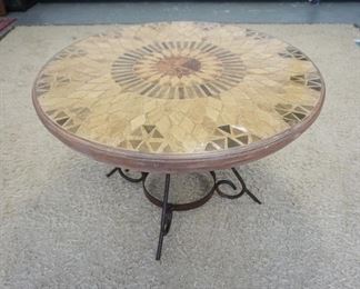 1020	STONE MOSAIC TOP TABLE ON FANCY WROUGHT IRON BASE, 48 IN X 30 1/2 IN HIGH
