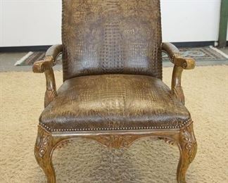 1036	TRUMP CARVED ARM CHAIR, FAUX ALLIGATOR, 28 IN WIDE X 40 IN HIGH
