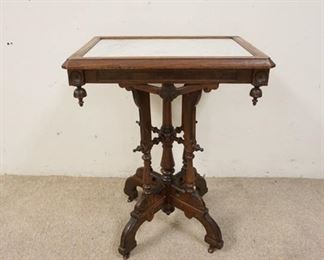 1086	VICTORIAN INSET MARBLE TOP TABLE, HAS DROP FINIALS, 24 IN X 18 IN X 30 IN HIGH
