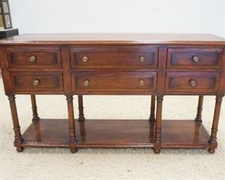 1129	SIX DRAWER SIDEBOARD WITH A SHELF BENEATH. 65 IN WIDE X 36 IN HIGH X 18 IN DEEP
