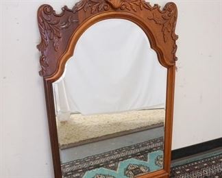 1134	CARVED BEVELED MIRROR WITH SHELL CREST. 24 IN X 48 IN.
