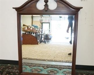1137	BEVELED MIRROR WITH BROKEN ARCH TOP. 35 1/4 IN X 46 1/2 IN
