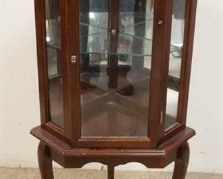 1154	SMALL MIRROR BACK CORNER CURIO CABINET ON CABRIOL LEGS. WEAR TO TOP FINISH. 21 1/4 IN X 39 1/2 IN HIGH
