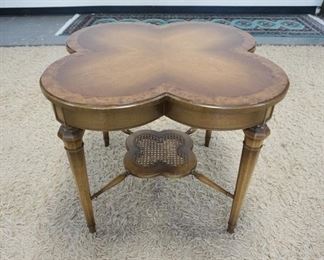 1176	CLOVER TOP BURL BANDED LAMP TABLE WITH A CANNED LOWER CENTER SHELF. 26 IN X 23 IN HIGH
