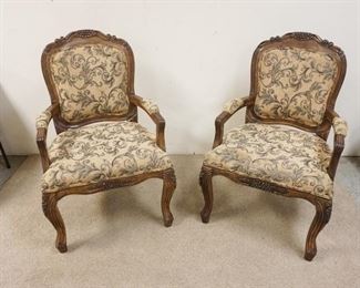 1179	PAIR OF UPHOLSTERED CARVED CENTURY ARM CHAIRS
