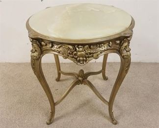 1180	CARVED FRENCH TABLE WITH INSET ONYX TOP. 26 IN X 29 1/4 IN
