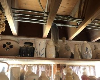 Shelves of Pottery by Andy Phibbs