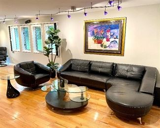 $3000 for the SET: 2 PC. Zuri Black Leather Sectional Sofa and Swivel Chair