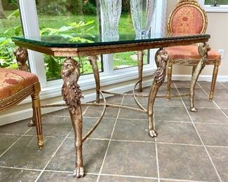 $1200 - Foyer/Display Table: French Style Glass Top Table with Lion Motif Legs - Measures 50" x 32" x 26". Not tall enough to serve as a dining table!