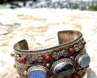 $68 - Sterling silver cuff bracelet with semi-precious stones