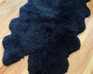 SOLD - $150 - Authentic Sheepskin Black Rug - Measures 70" x 42"