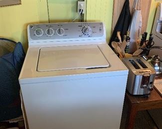 Kitchen 
GE washing machine 
Has matching dryer as well.