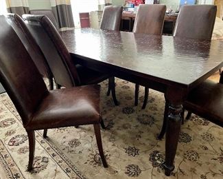 Reclaimed wood table with 8 high back distressed leather chairs 