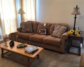 We have 2 of these sofas, maple coffee table and end table, lamps