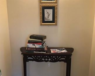 books, foyer table, hummingbird prints