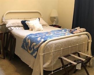 Metal vintage bed, quilt, suitcase rack