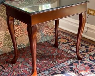 Pair of Bombay Company Queen Anne-style cherry side tables with glass toppers. Each measures 25" D x 17" W x 24" H. Beautiful, timeless shape. Paint to create a more modern or coastal chic look and feel.