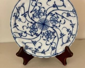 Blue and white decorative trivet. Made in Germany. Measures 6" D. Photo 1 of 2.