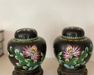 Pair of ebony chinoiserie ginger jars on rosewood stands. Measures approximately 4" H.