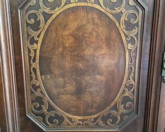 Antique Jacobean-style storage cabinet sideboard with turned wood legs and floral cartouche detailing. Circa 1920. Measures 42" W x 32" H x 19" D. Photo 2 of 2.