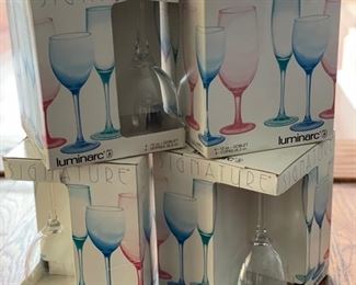 4 boxes of 12-ounce Luminarc Signature wine glasses. One box is missing one glass. Photo 1 of 2.