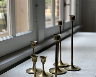 Set of six brass candlesticks.