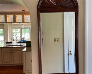 Vintage arched mirror. Measures 38" H x 18" W.