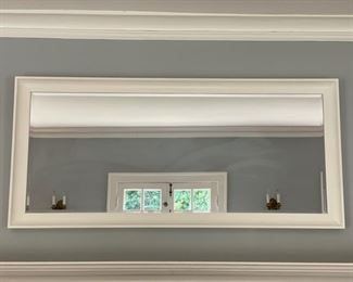 White frame mirror. Measures 63" W x 29" H.