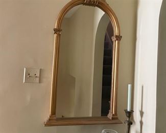 Gilt arched mirror. Measures 44" H x 23" W. Photo 1 of 2.