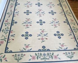 Vintage floral Dhurrie rug from Village Carpets. Measures 6' W x 8'7" L.