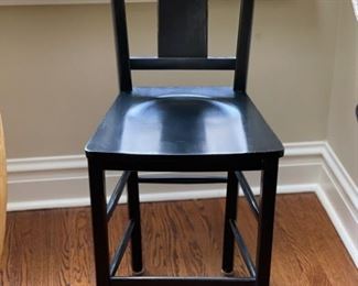 Set of 4 ebony counter stools. Each measures 39" H x 16" W. Seat height is 24".