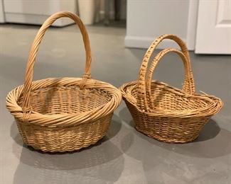Assorted baskets with handles.