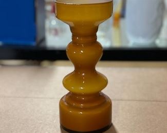 Amber glass candleholder.