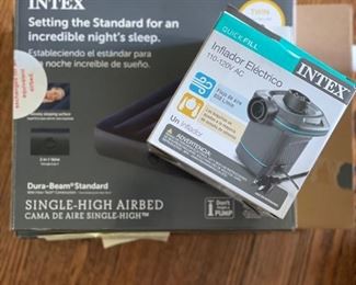 Intex single high airbed - 2 available - and pump.