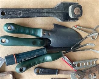 Assorted tools and garden tools.