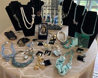 Costume jewelry including necklaces, earrings and a Faberge egg!