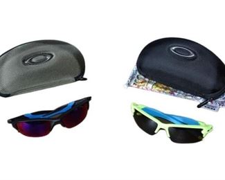 Two 2 pairs Of OAKLEY Sunglasses With Case