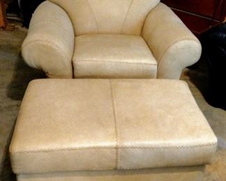 Custom made western style beige chaps leather with contrasting brown stitching chair and ottoman set