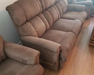 Mint Condition Lazyboy Couch and 2 Chairs. Couch reclines on both ends and Chairs are reclining as well. All matching set
