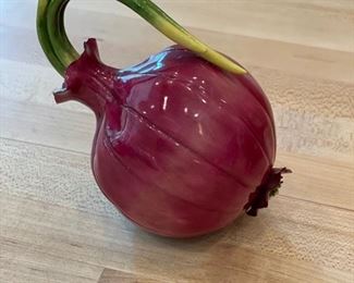 Porcelain red onion signed by artist. 