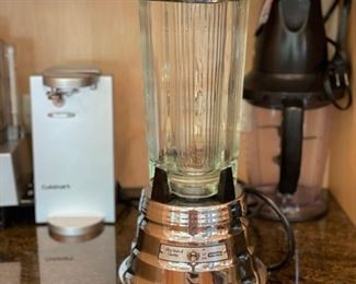 Waring blender. Cuisinart can opener. 