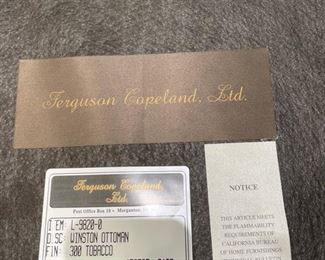 Ferguson Copeland Winston club chair and ottoman upholstered in quilted tobacco leather with nailhead trim - 2 available. Each chair measures 25" W x 30" D x 42" H; ottomans measure  27" x 20". Photo 2 of 2. 