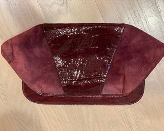 Versace red suede and leather clutch, Photo 1 of 2. 