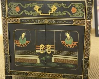Antique ebony chinoiserie side table. Measures 20" x 14" x 23"H. 