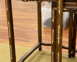 Set of 4 antique teak glass-topped stacking tables with bovine inlay. Largest measures 20" W x 15" D x 26" H; smallest measures 10" W x 12" D x 19" H. Photo 3 of 4. 