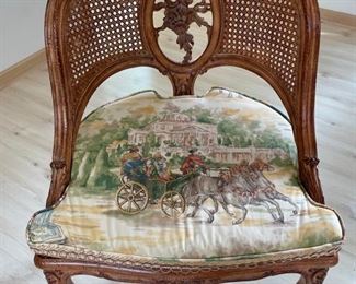 Antique French carved wood game table with parquet top and hidden bid drawers purchased from E. G. Cody. Four cane-back chairs upholstered in Scalamandre toile fabric available, too..  Photo 5 of 5.