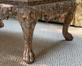 Carved bronzed wood cocktail table with stone top. Measures 45" W x 28" D x 20" H. Photo 1 of 2. 