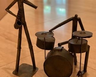 Z Gallery metal sax and drummer statues. 